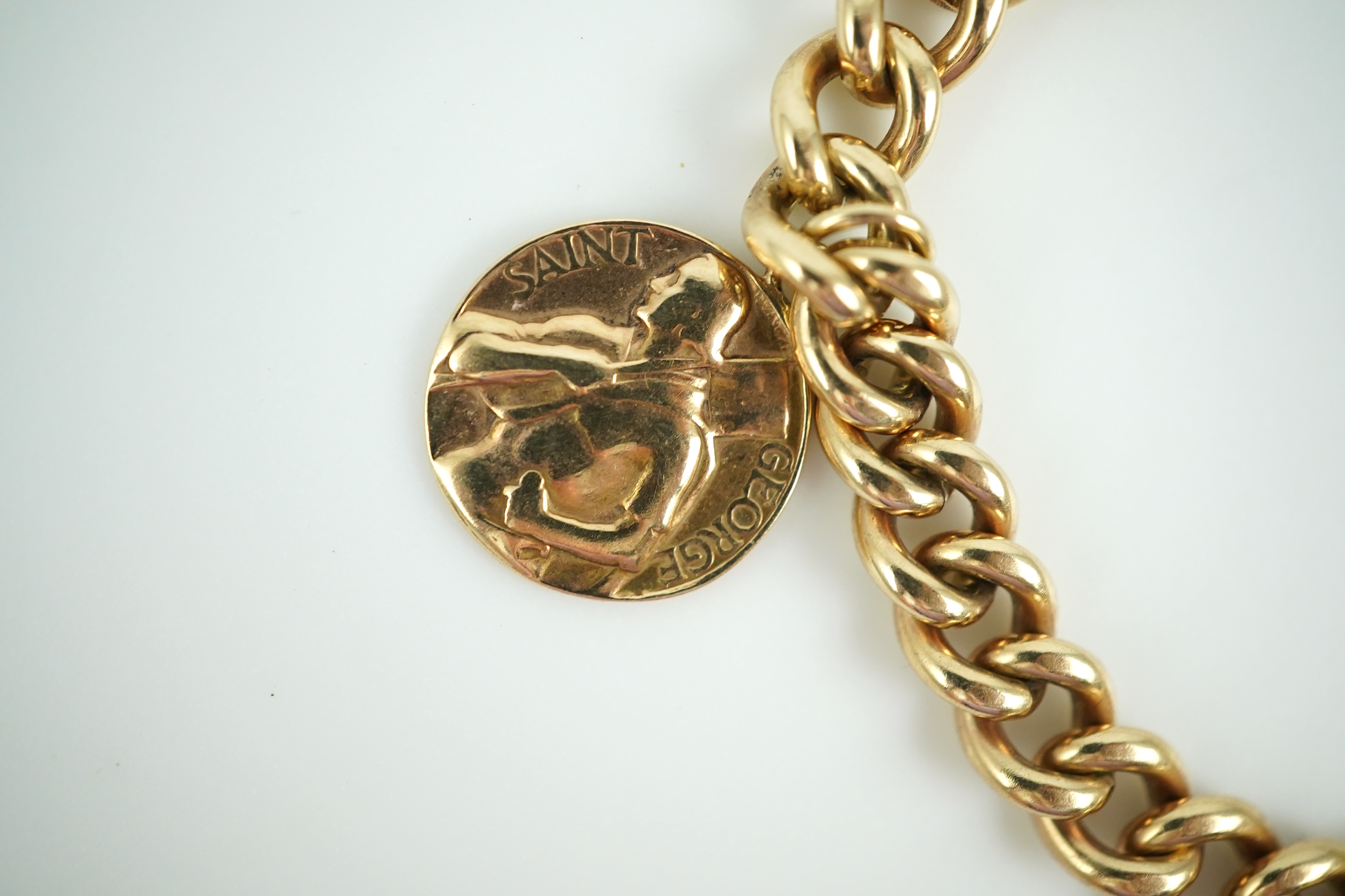 A 9ct gold charm bracelet, circa 1997